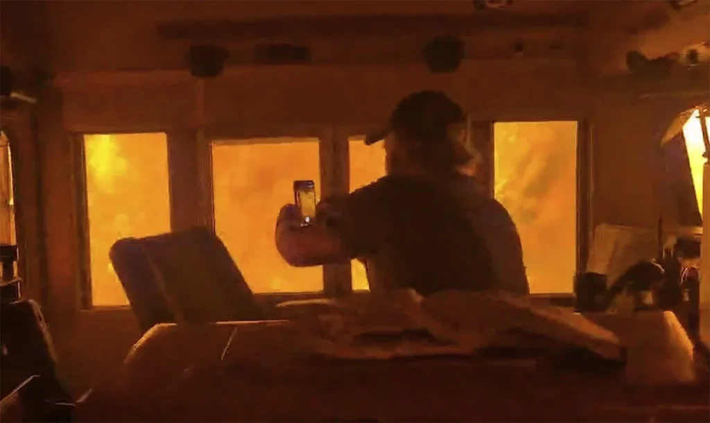 CN rail crew surrounded by Ontario wildfire flames