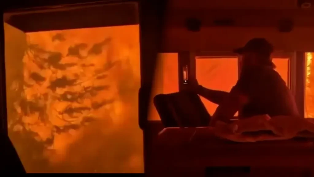 CN Rail wildfire evacuation train surrounded by flames in Armstrong Ontario
