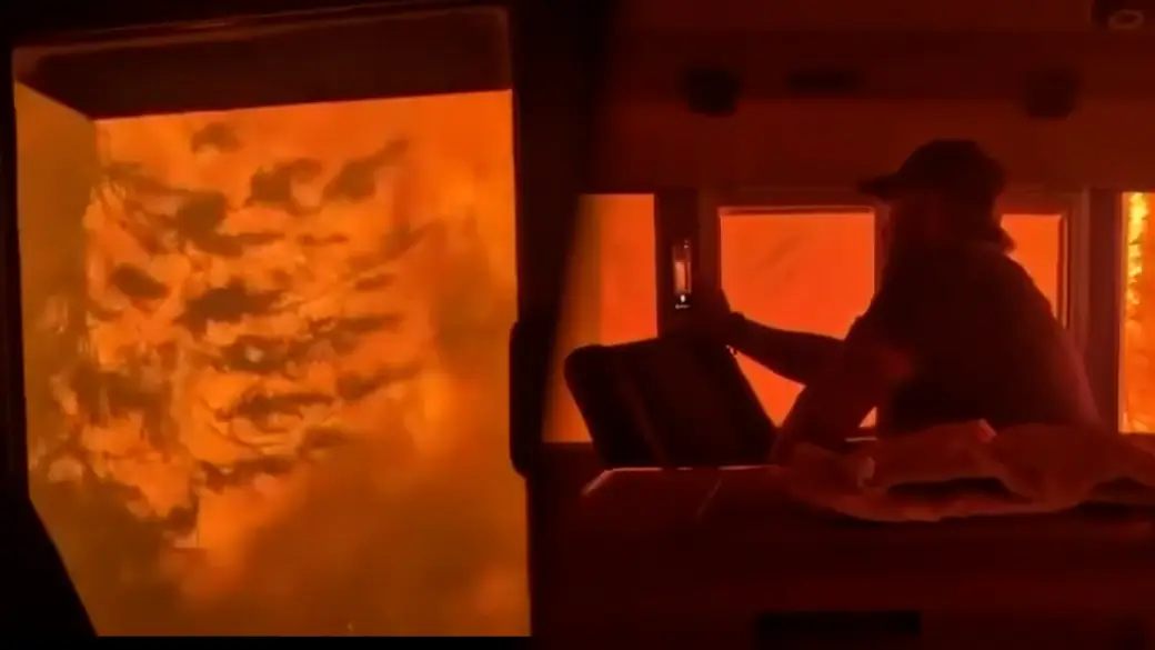 CN Rail wildfire evacuation train surrounded by flames in Armstrong Ontario