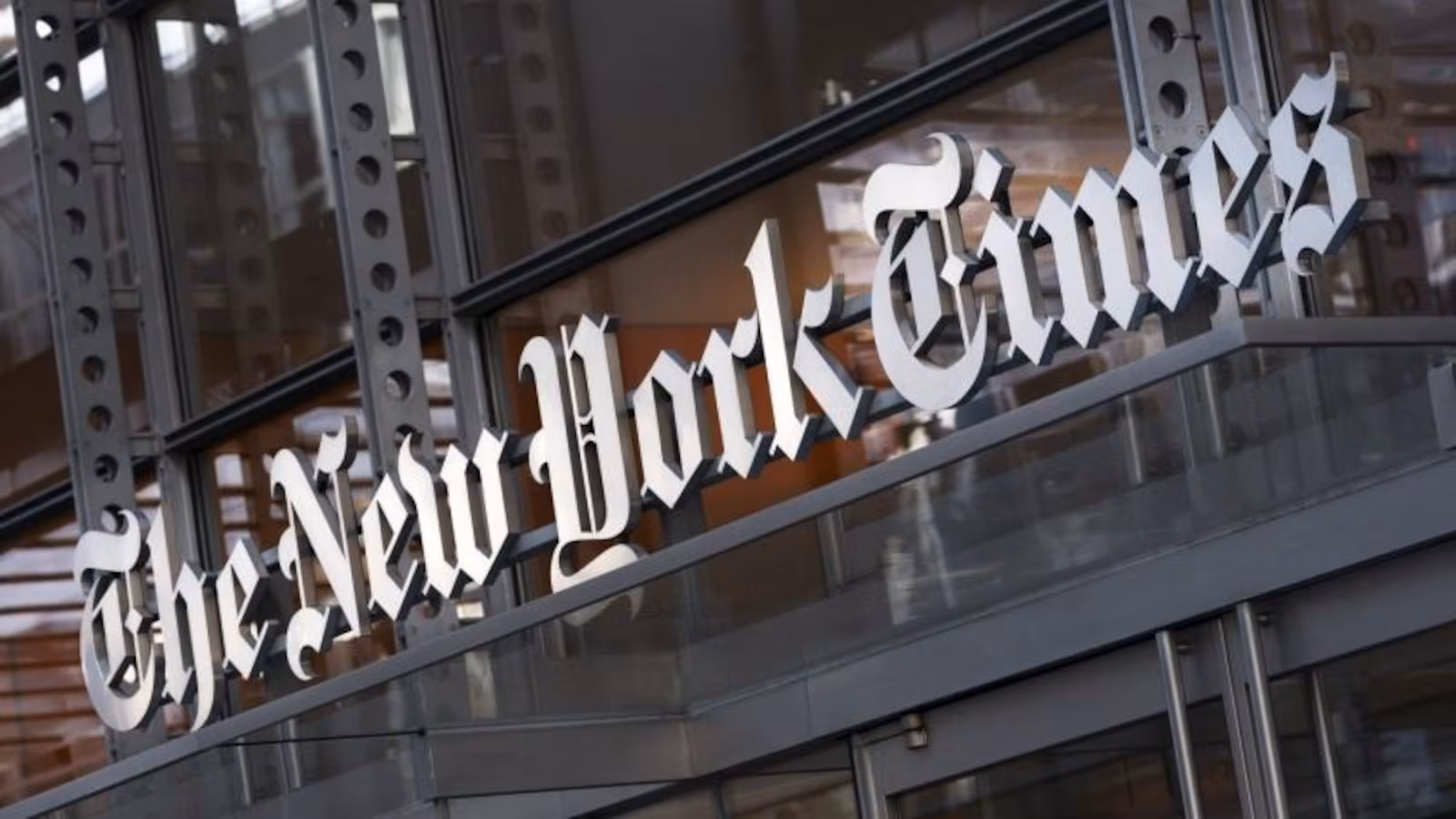 New York Times building sign representing OpenAI copyright sanctions case