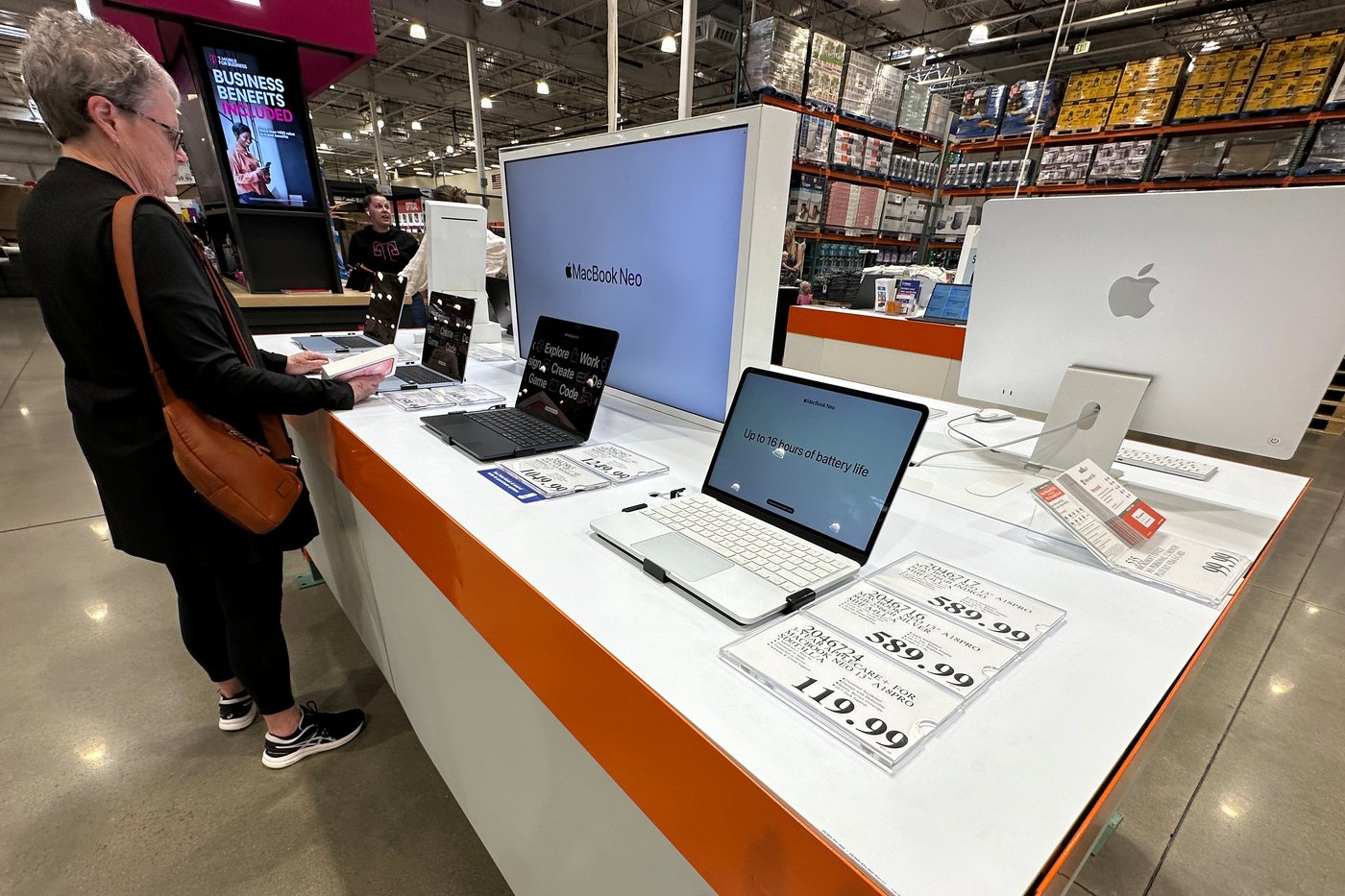 AI inflation threat impact on laptop prices in electronics store