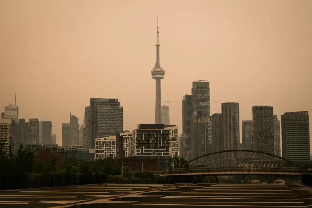 CN Tower shrouded in wildfire smoke haze Toronto