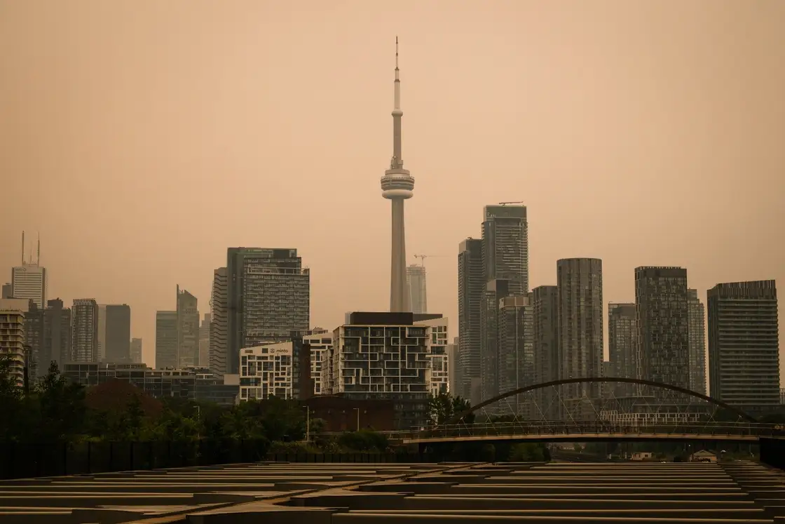 CN Tower shrouded in wildfire smoke haze Toronto