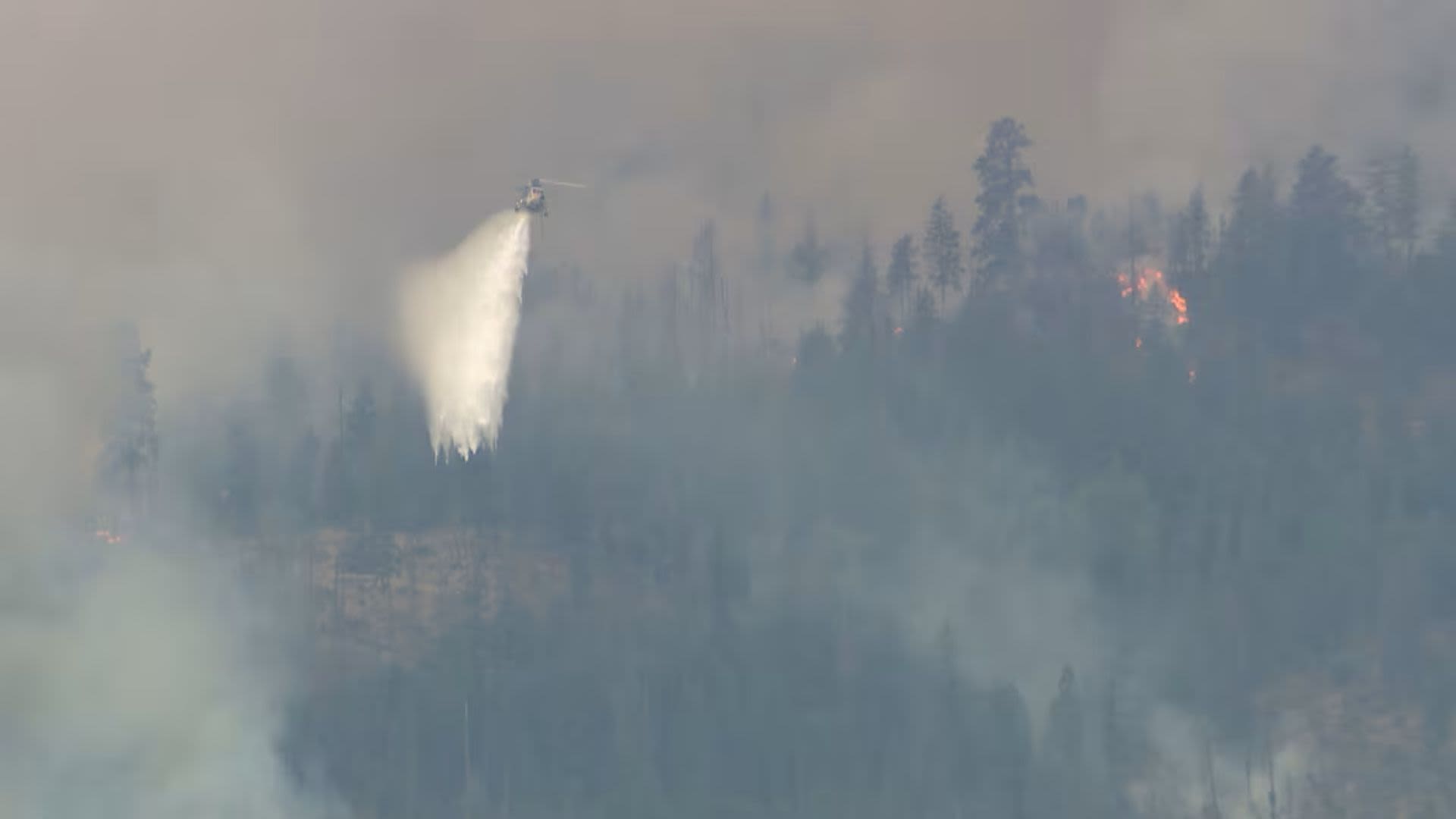 BC wildfire evacuation smoke over Okanagan Lake